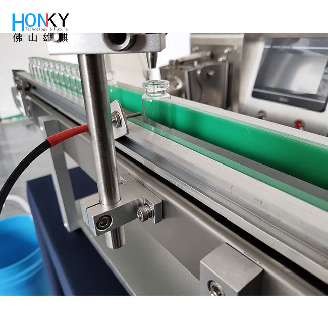 デスクトップライン タイプ 瓶詰め機 瓶詰めライン 瓶詰めコンベヤーと サムル・バッハ 皮膚ケア オイル詰め