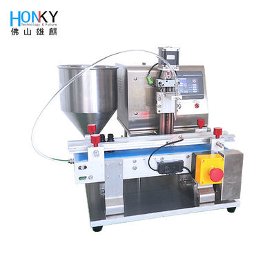 デスクトップコンベアを使用した少量生産、高精度セラミックピストンポンプを備えた美白クリームボトル充填機、化粧品包装用